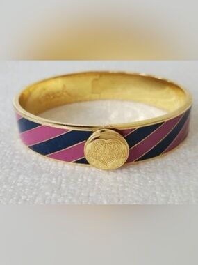 Coach Poppy Gold Tone Bangle Bracelet with Heart Hinge Closure